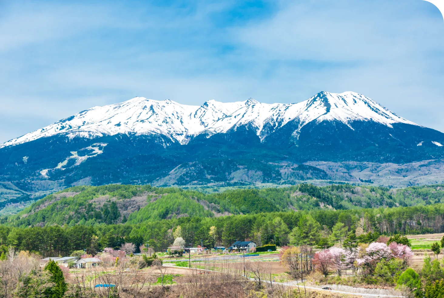 Snow-capped mountains and village in Kiso