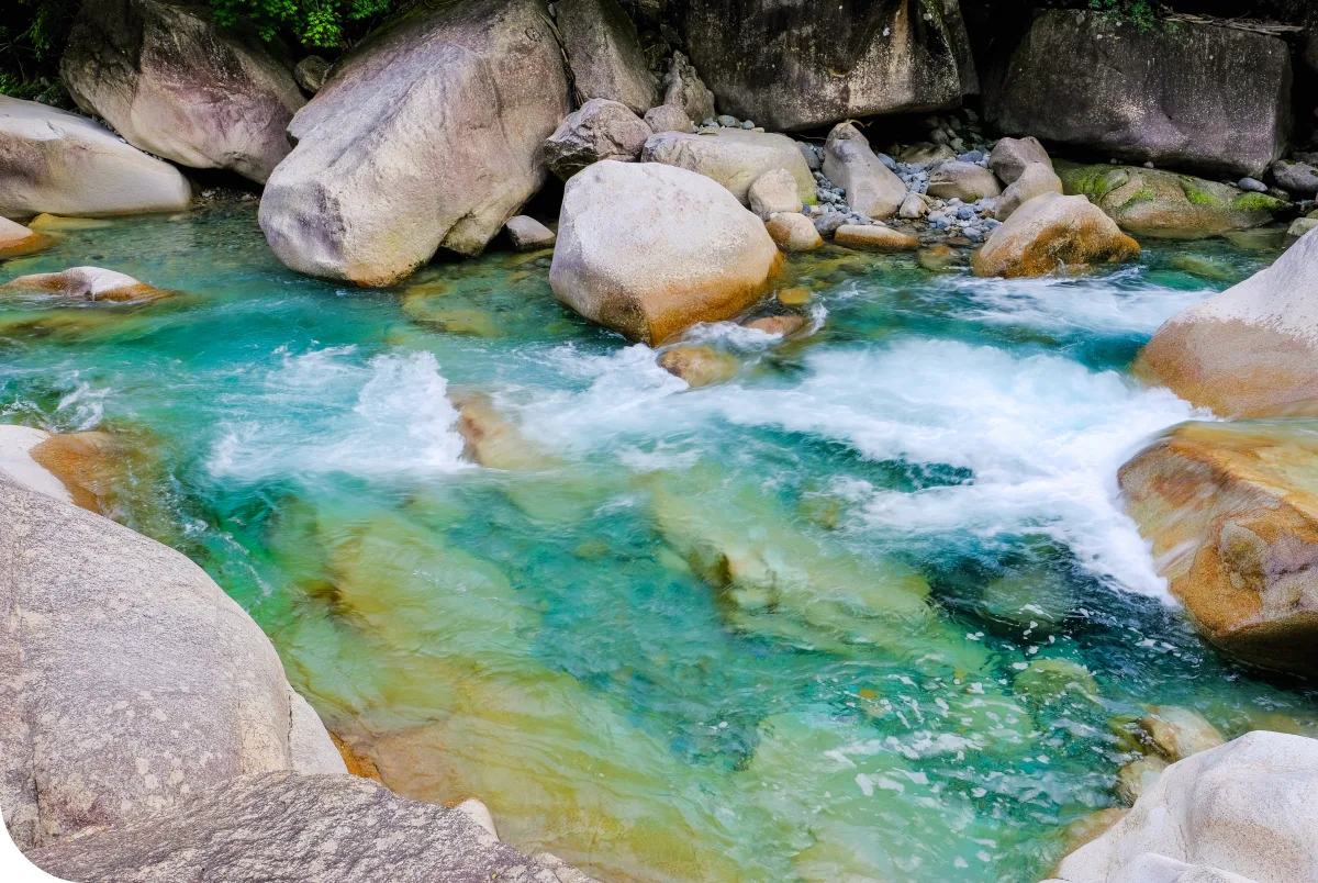 Clear river flowing through rocks in Kiso